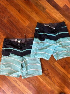 Volcom Aqua & Black Striped boys board shorts. Perfect condition size 23.